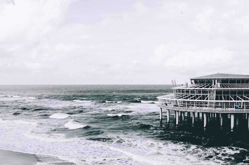 panoramic photography of structure on body of water