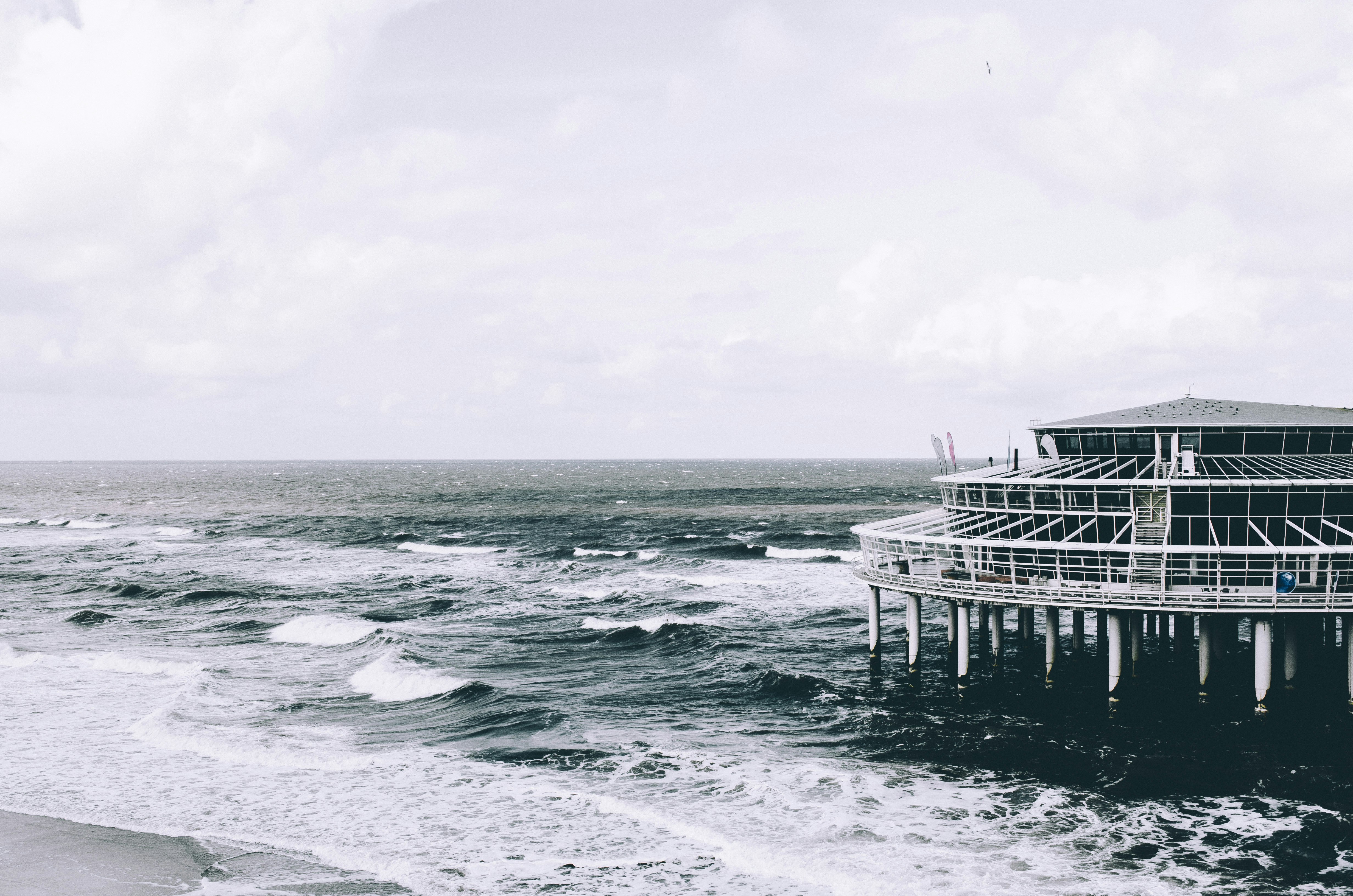 panoramic photography of structure on body of water