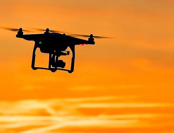 Tactical UAV monitoring city streets at sunset