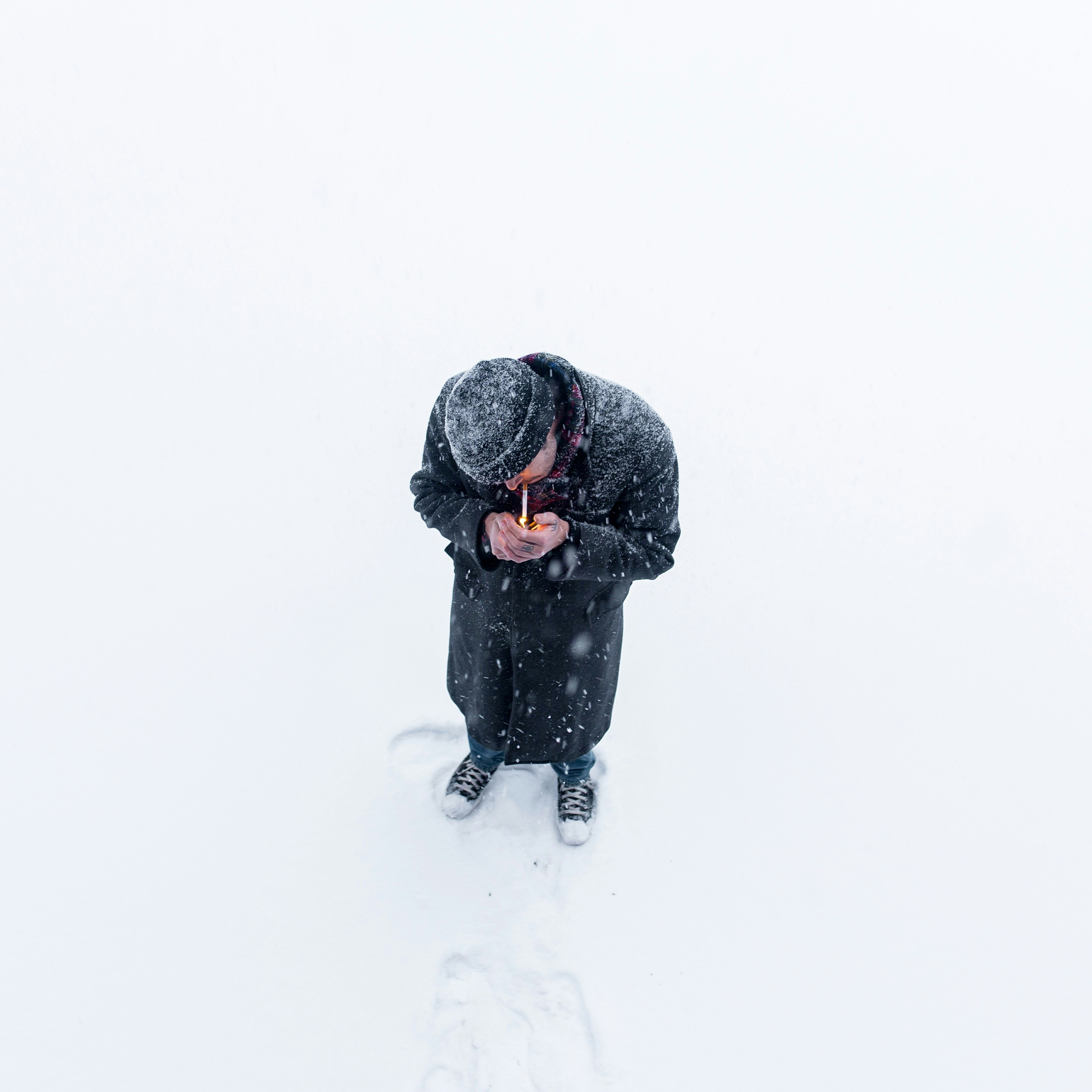 man standing on snow