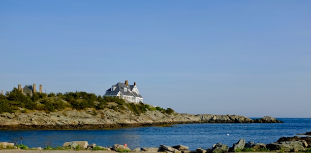 Elegant coastal residence with large windows overlooking the Ramsgate seafront at sunset.