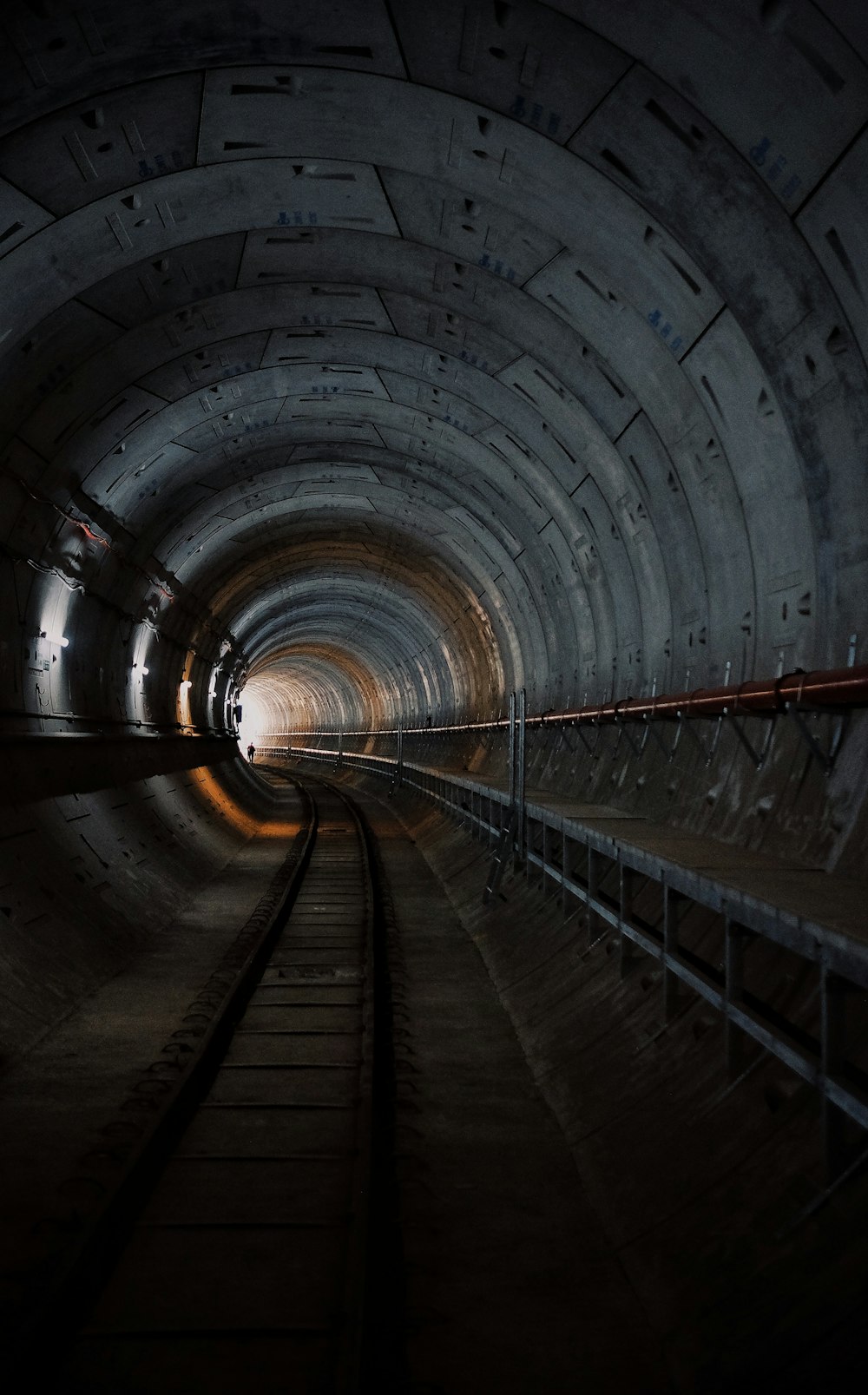 photo of train rail tunnel