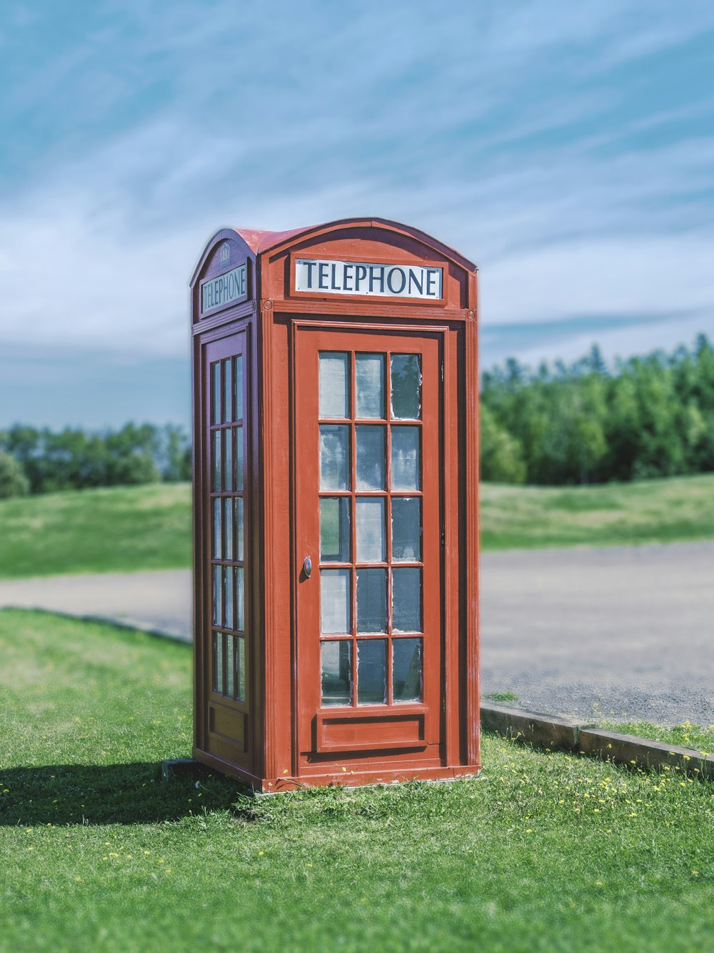 Telephone booth near road