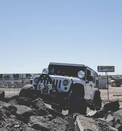 A high-tech GPS tracking device installed on a rugged off-road vehicle, illustrating advanced asset monitoring.