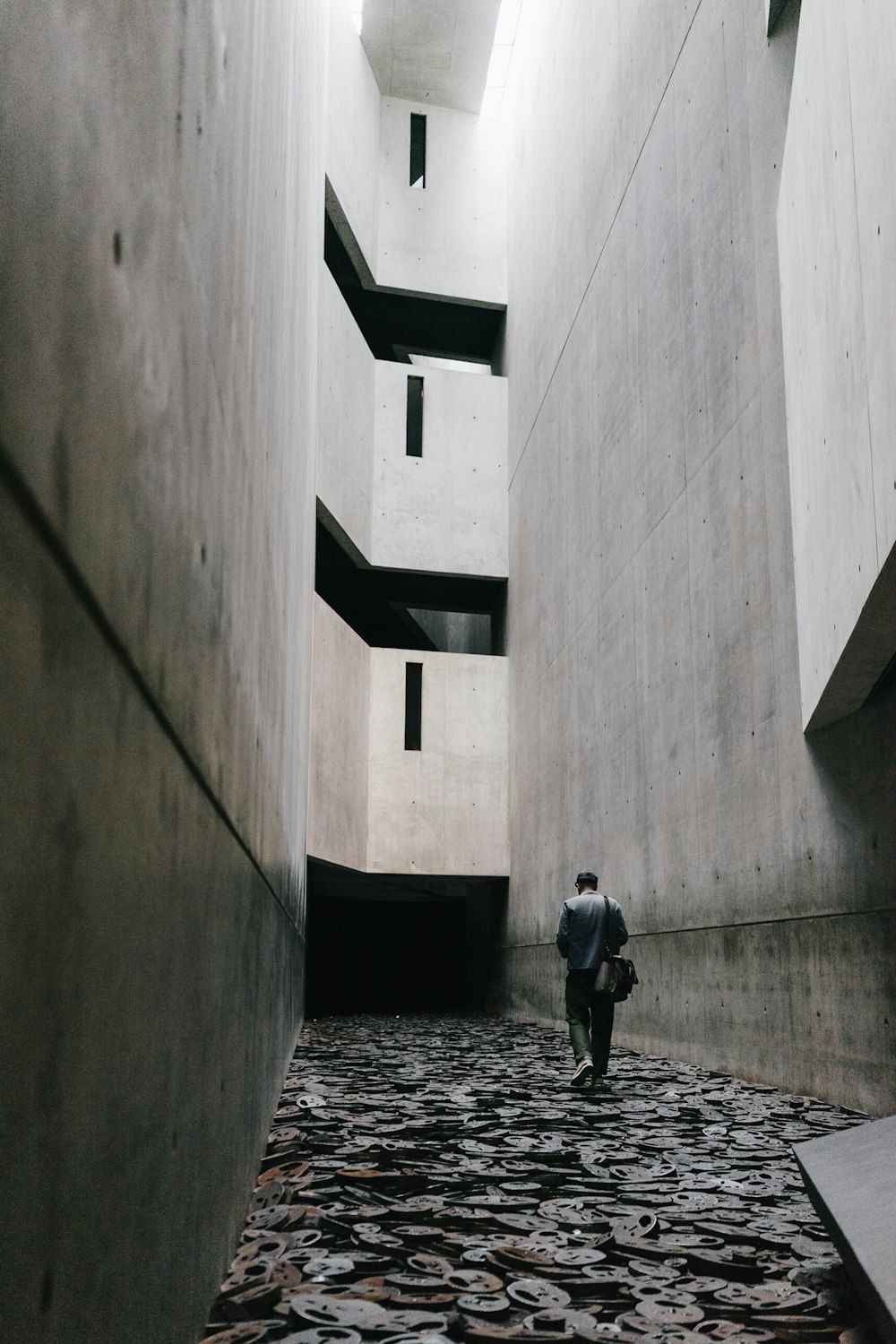 man walking in the hallwayu