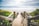brown wooden walkway near beach during daytime