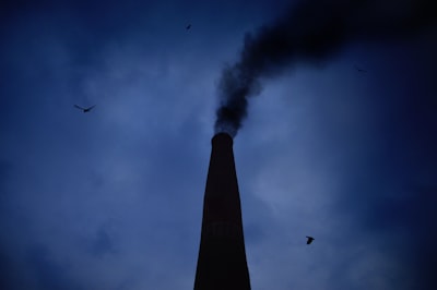 smoking chimney during night chimney zoom background