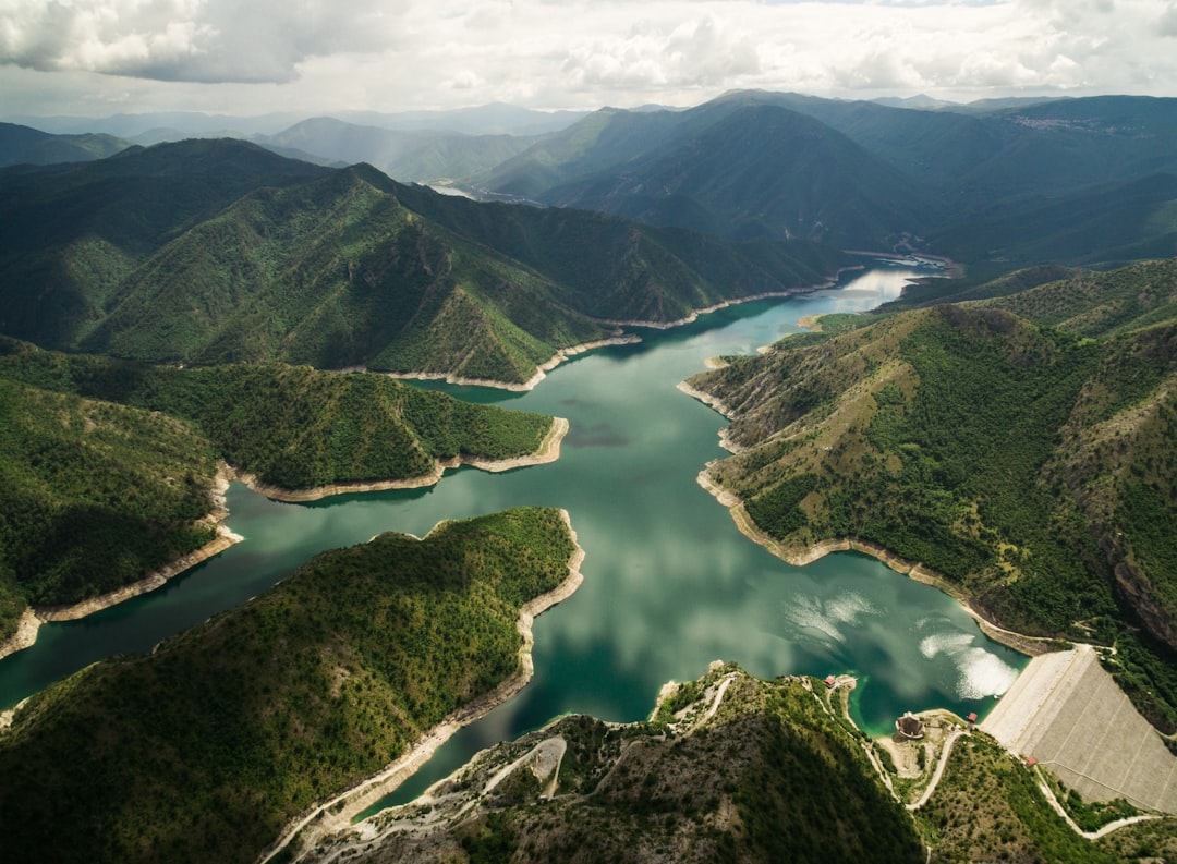 bird's eye view of river surrounded by mountains