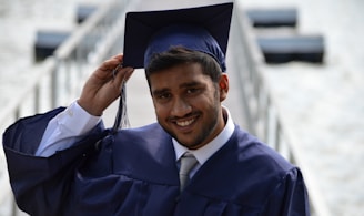 man holding his graduation cap
