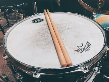 Close-up of classic congas and timbales, their worn surfaces telling stories of countless nights.