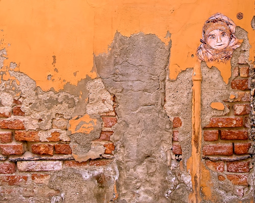 Foto de primer plano de pintura de pared naranja y gris