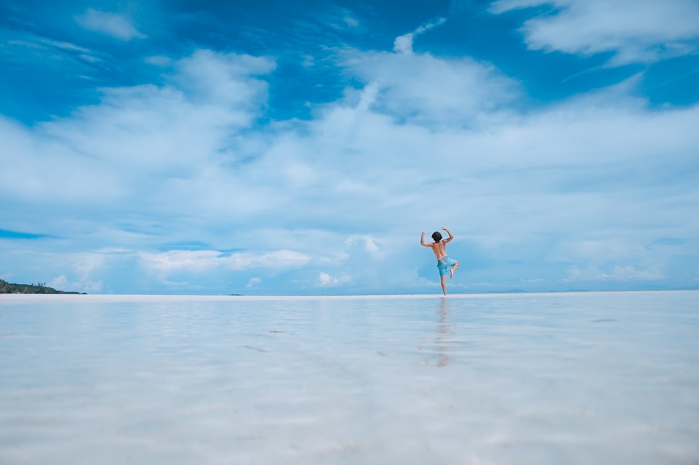 person standing in body of water