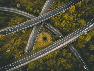 aerial photography of interlocking freeways with travelling cars