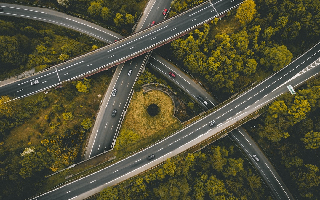 aerial photography of interlocking freeways with travelling cars