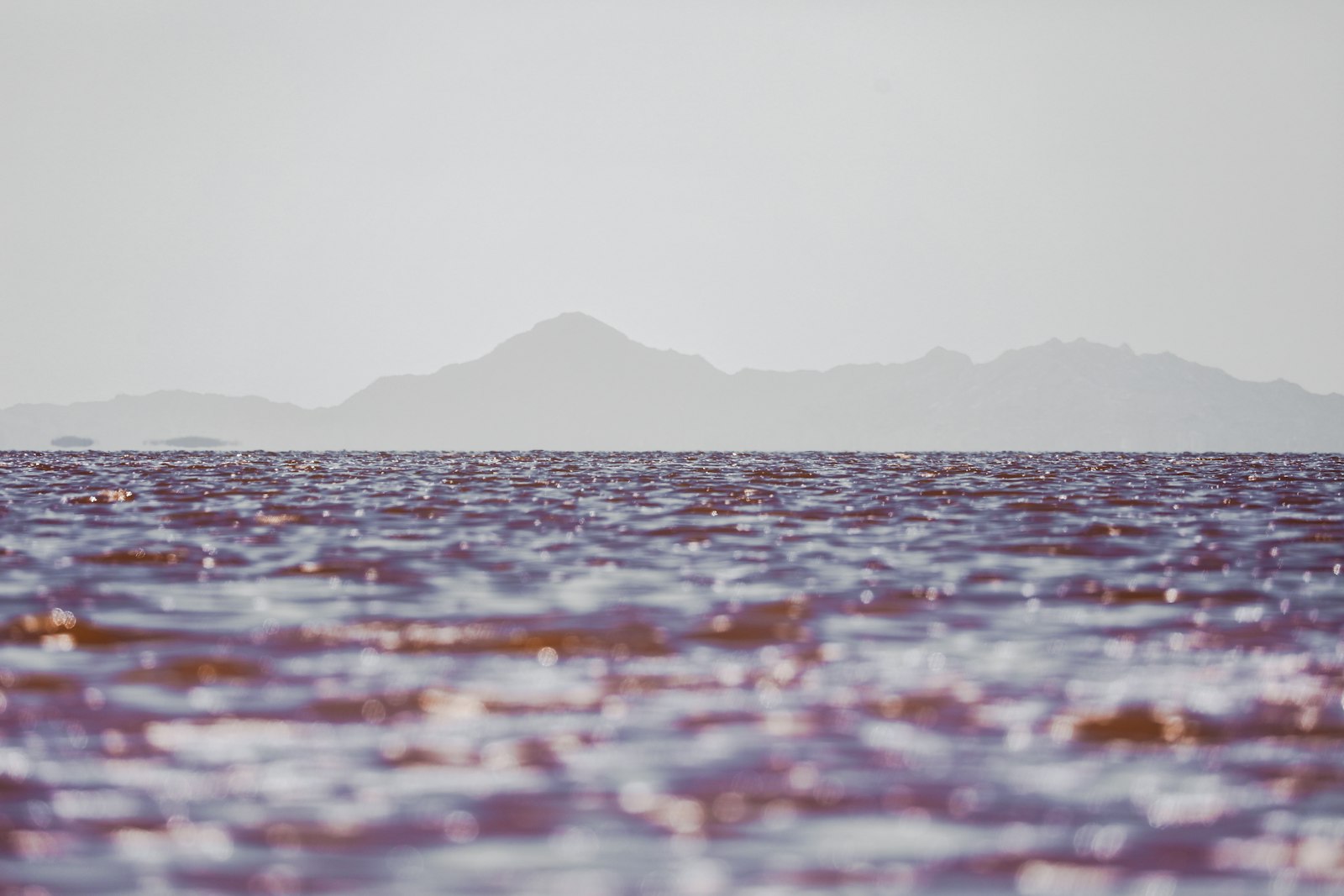 Canon EF 100-400mm F4.5-5.6L IS II USM sample photo. Ocean waters with mountain photography