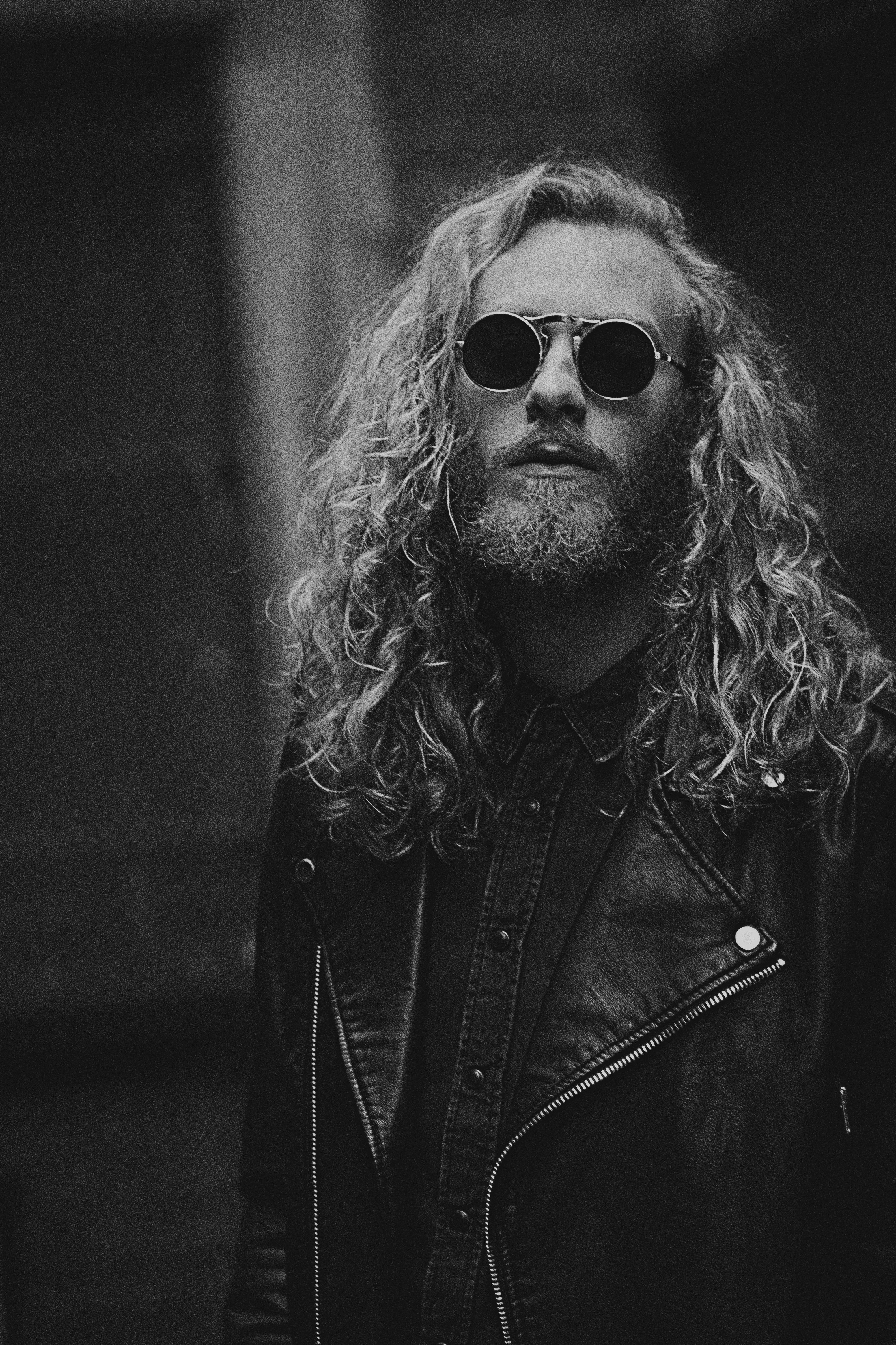 great photo recipe,how to photograph m: patryk kepinski; grayscale photo of man in leather jacket