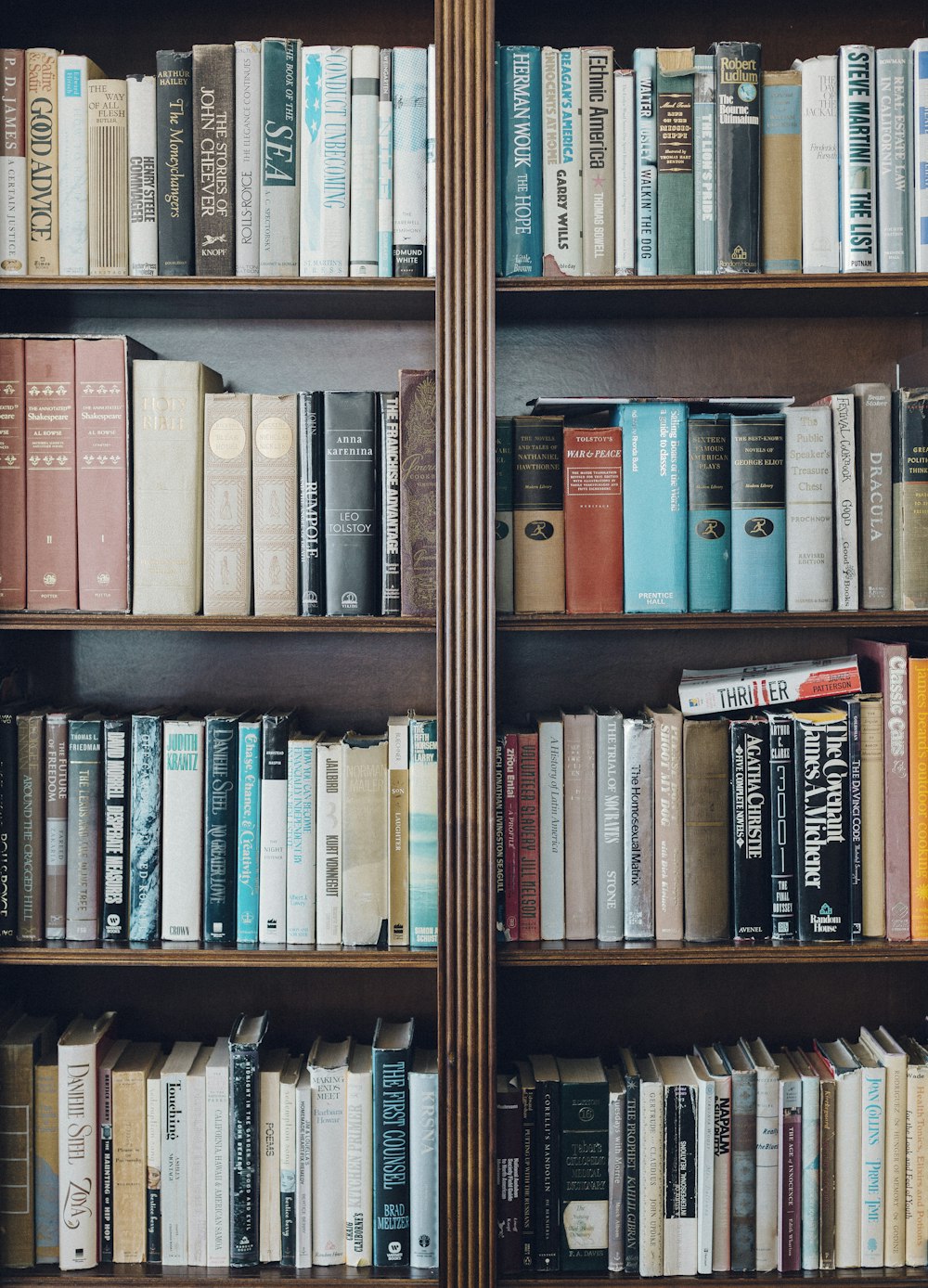 assorted-title book in bookcase