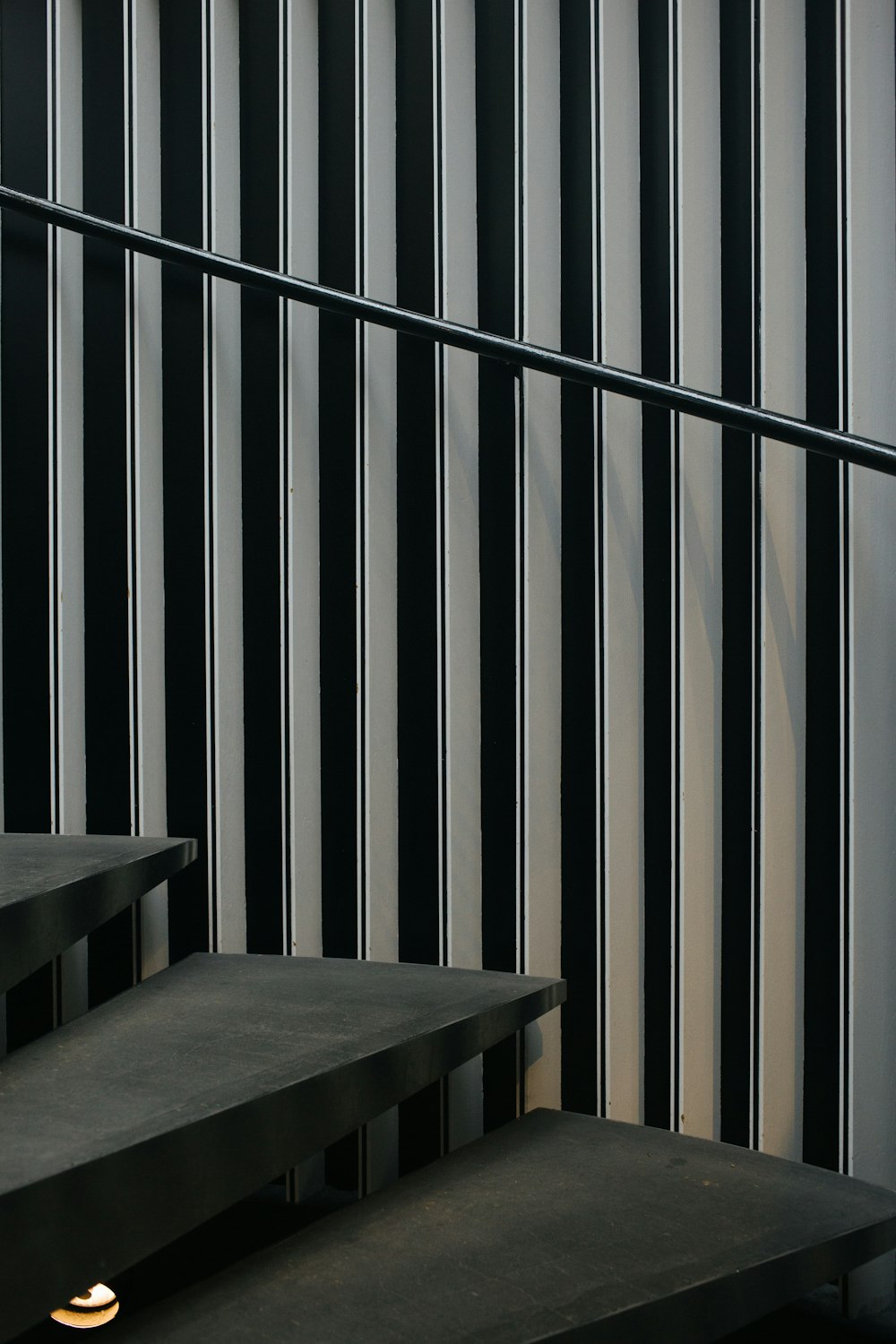 architectural photography of gray stair