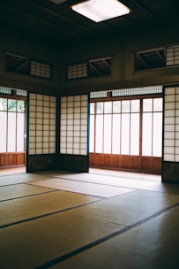 Bedroom with tatami mats and shoji screens.