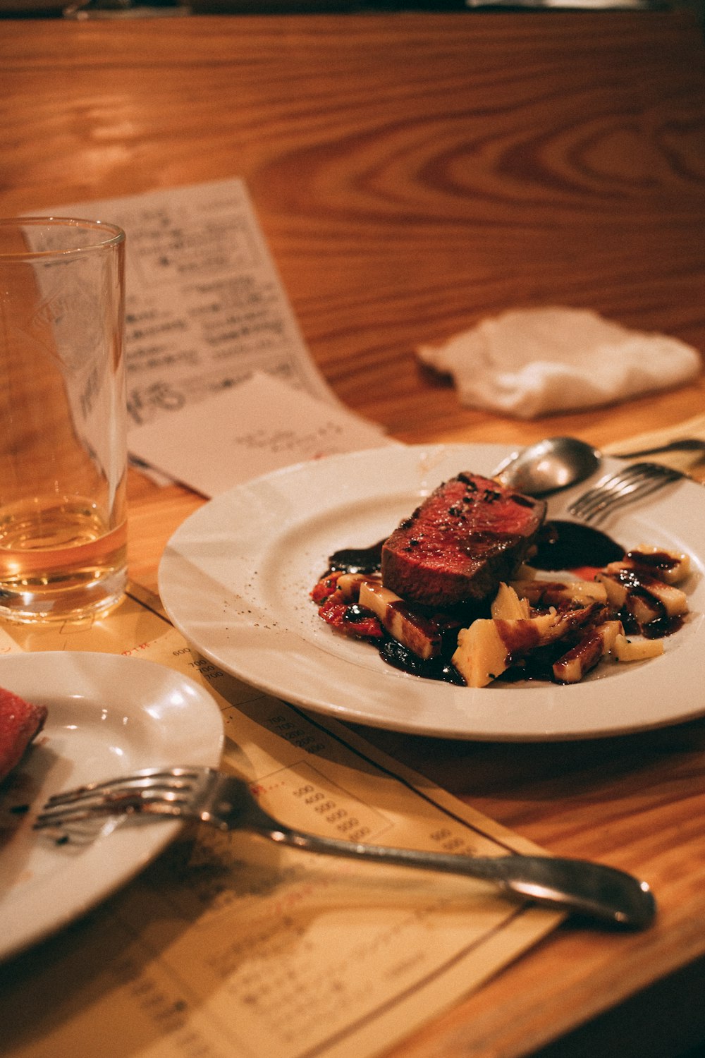 meat with sauce in ceramic plate