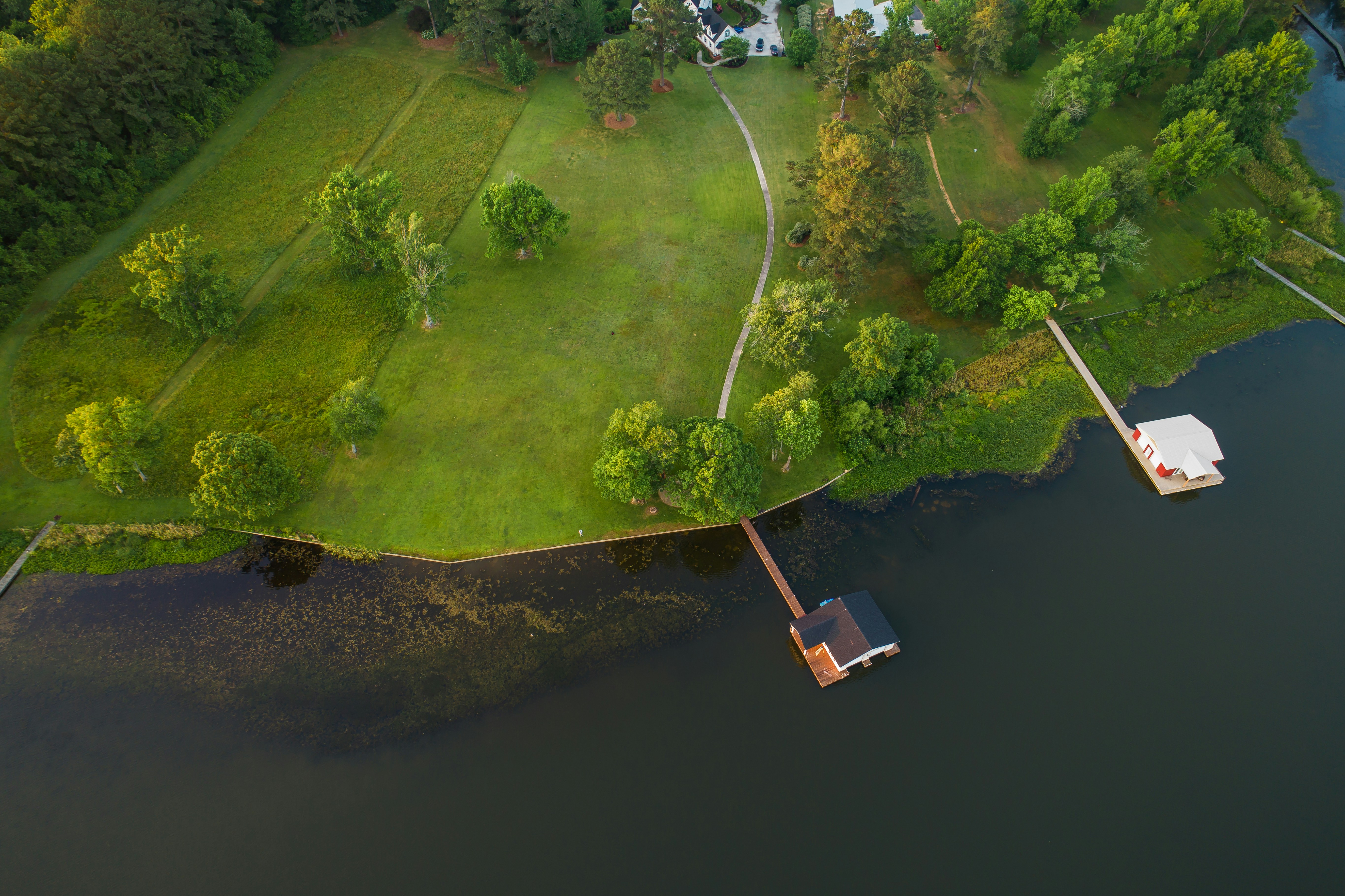 aerial of house near river alabama teams background
