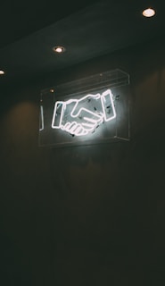 human hand neon signage