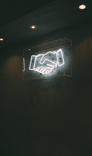 human hand neon signage