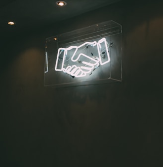 human hand neon signage