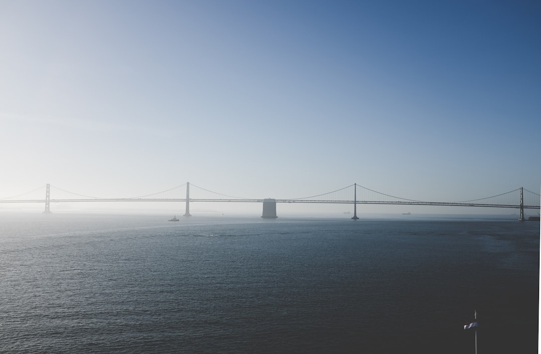 steel bridge under blue sky