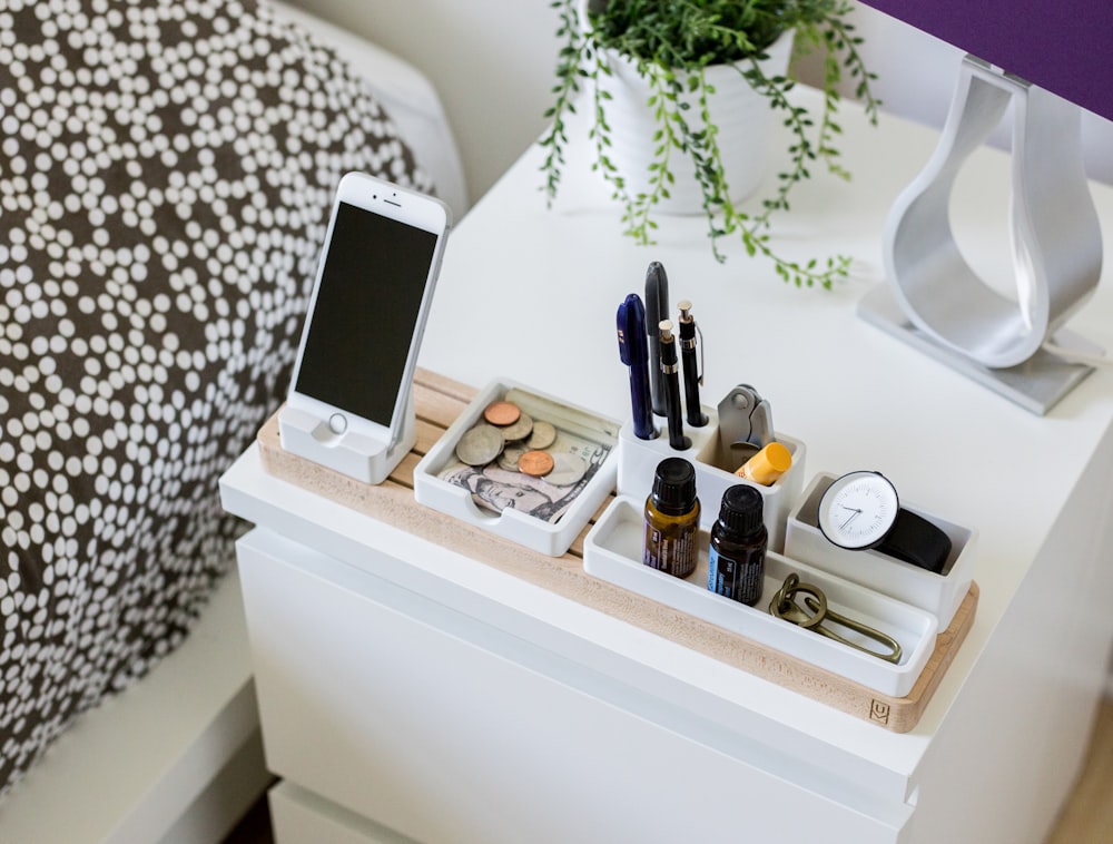 silver iPhone 6 on organizer rack