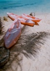 three empty kayaks