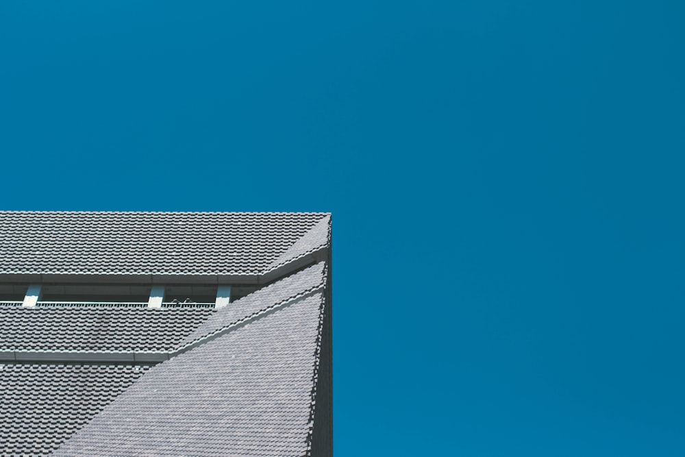 gray concrete building in low angle photography at daytime