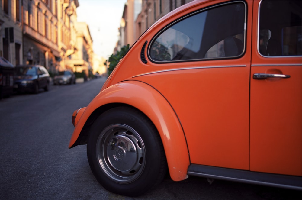 red Volkswagen New Beetle