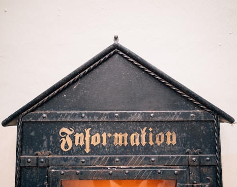 close-up photography of Information signage