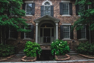 brown and white 2-storey house