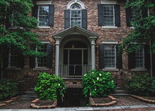 brown and white 2-storey house