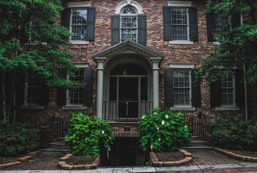 brown and white 2-storey house