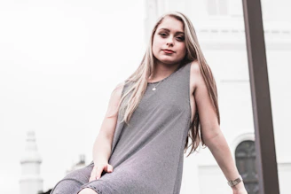 Young woman looking confidently into the camera, portrait mode 4:6 format