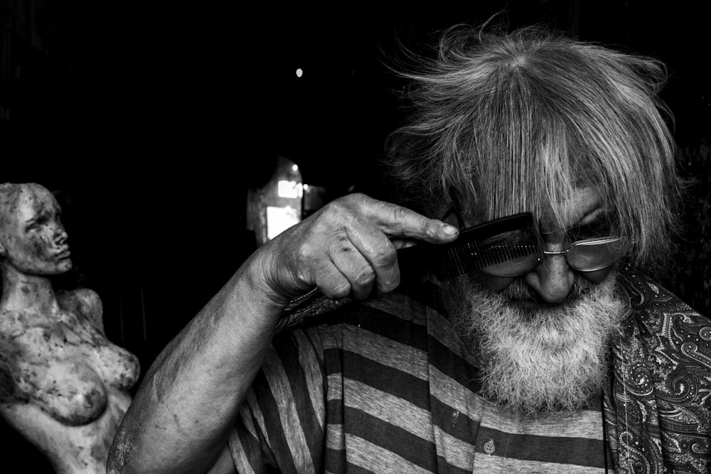 man using comb