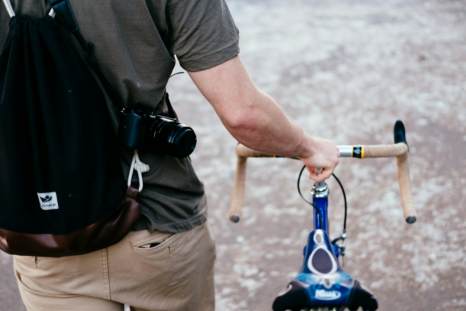 Fujifilm X-Pro2 + Fujifilm XF 35mm F2 R WR sample photo. Man holding brown and photography