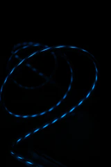 Creative 3D logo animation with glowing blue highlights on black background.