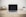 MacBook Pro on top of brown table