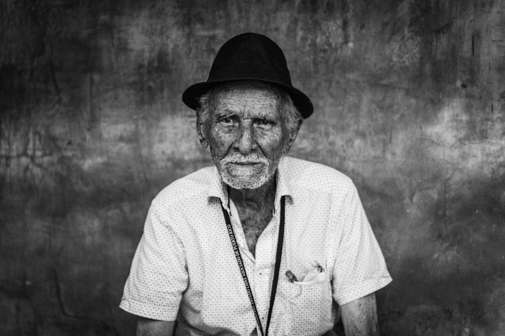 man wearing shirt and hat