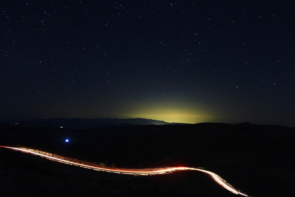 time lapse photography of road at night time