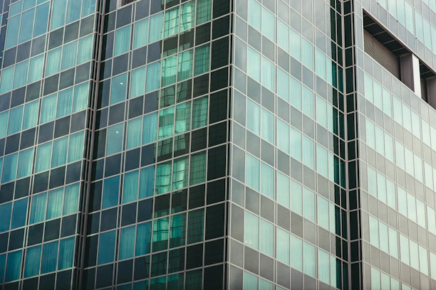 A sleek modern glass window installation in a contemporary office building.