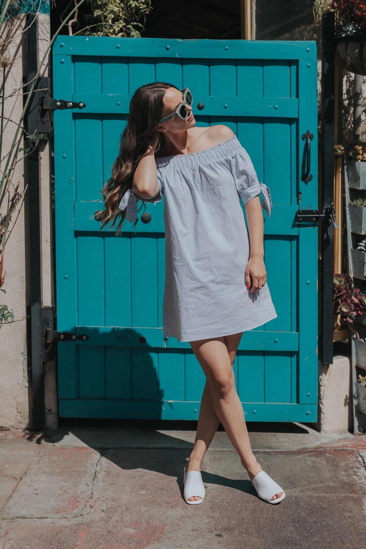 Designer working in a bright modern fashion studio