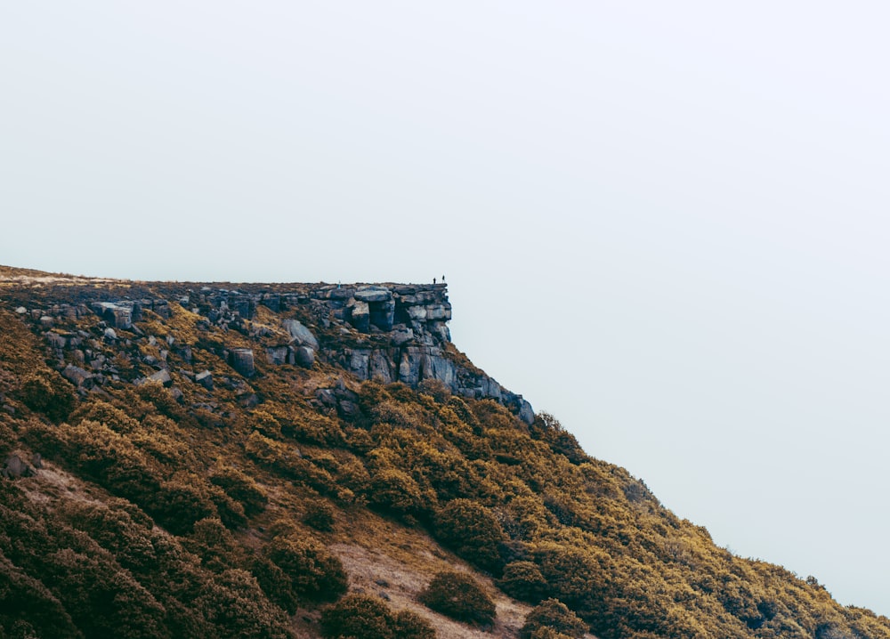 rocky hill during daytime