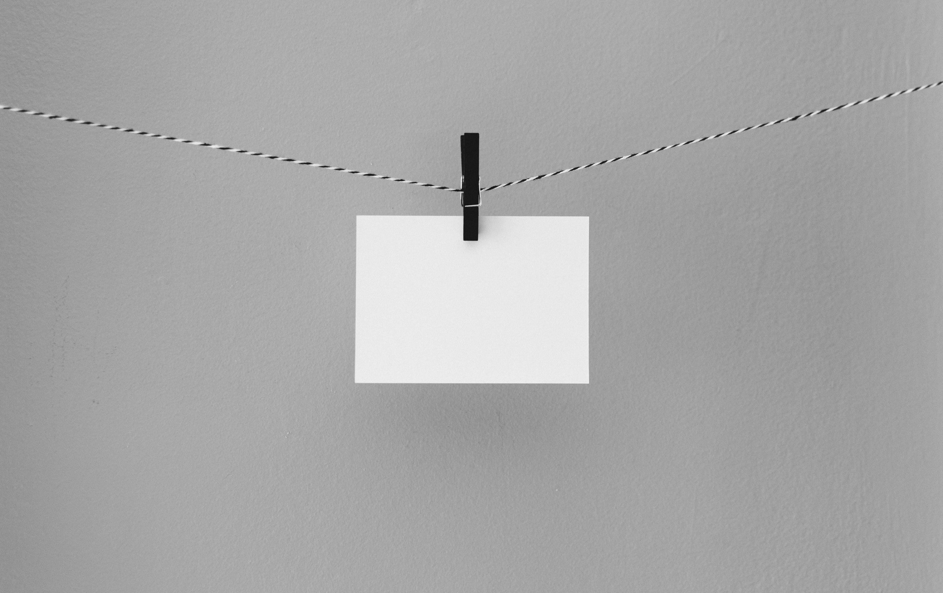 hanged white printing paper