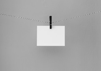 hanged white printing paper