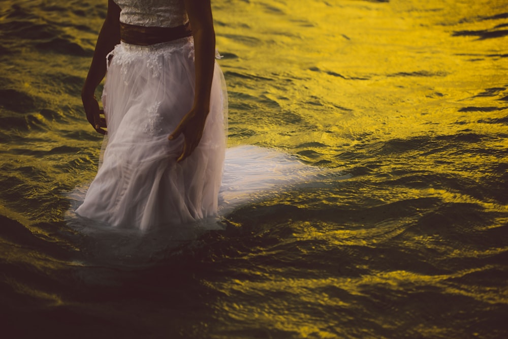 person walking on body of water